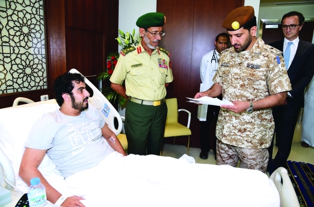 "■ حمد الرميثي خلال زيارته المصابين والجرحى وام"