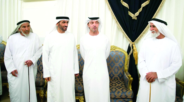 "■ هزاع ونهيان بن زايد خلال العزاء"