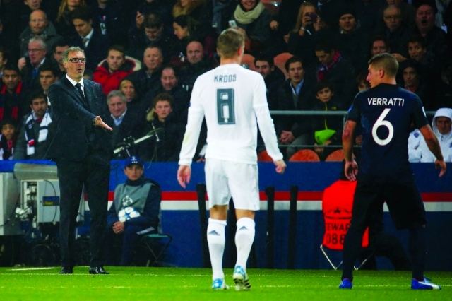 "■ بلان يوجه فيراتي خلال مباراة جرمان وريال مدريد | رويترز"