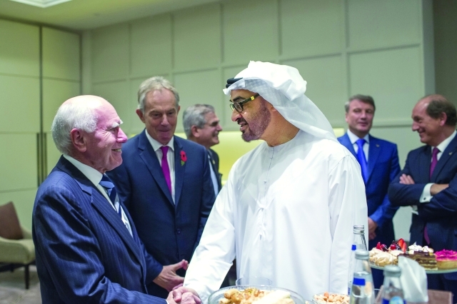 "محمد بن زايد مرحباً بأعضاء مجلس جي بي مورغان الدولي بحضور توني بلير ــ وام"