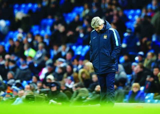 "■ مانويل بيلغريني عقب خسارة مانشستر سيتي أمام ليفربول | أ ف ب"