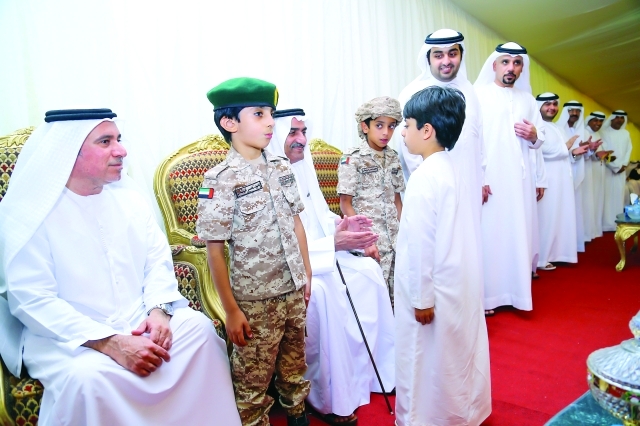"■ الشرقي يلاطف أبناء الشهيد ناصر البلوشي"
