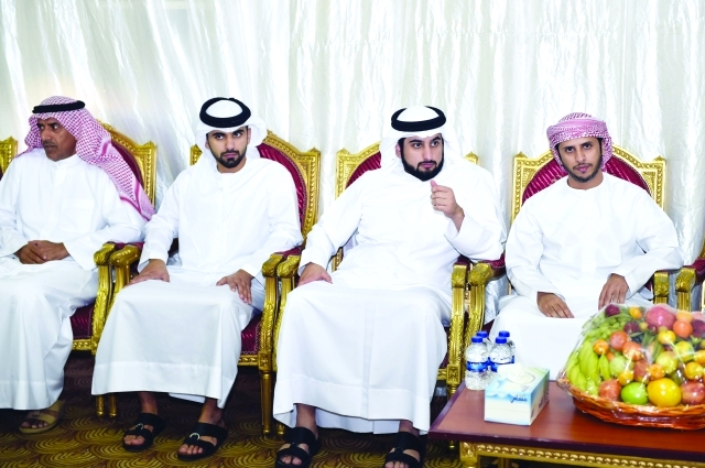 "■ أحمد ومنصور بن محمد خلال تقديم العزاء"