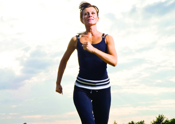 "40 year old runner working out, part of a series of sports images."