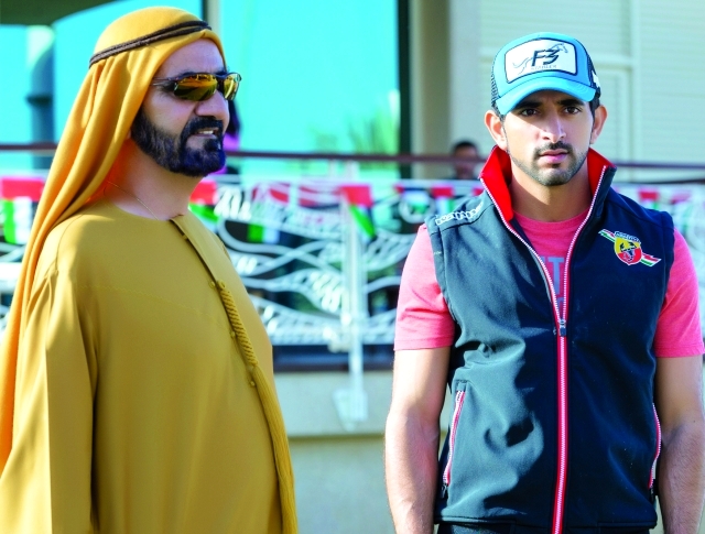 "محمد بن راشد وحمدان بن محمد خلال حضور السباق | تصوير: علي عيسى"