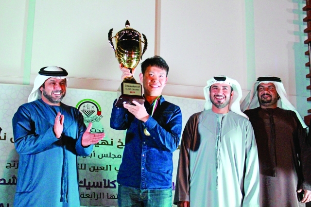 "■ المقبالي والنعيمي مع البطل الصيني | البيان"