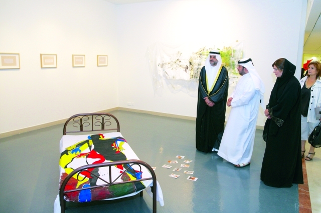 "■ ..ويعاين أحد الأعمال"