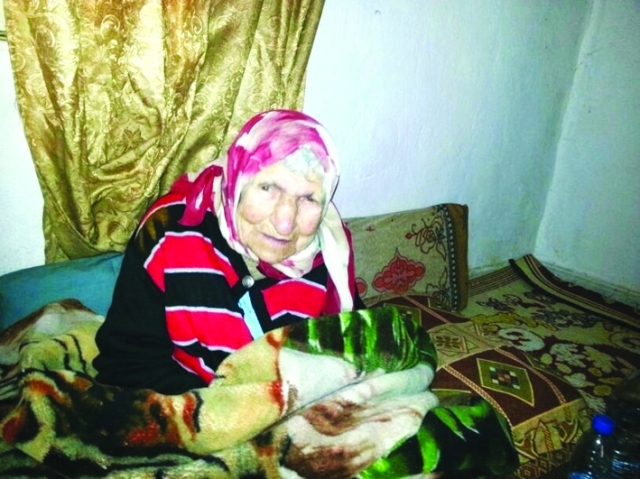 "■ الحاجة أم محمد في منزلها"