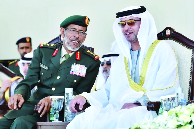 "■ هزاع بن زايد وحمد الرميثي خلال حفل التخريج"