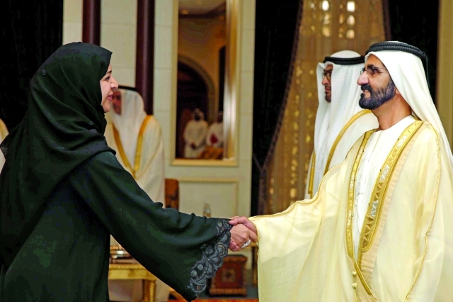 "■ نائب رئيس الدولة مصافحاً ريم الهاشمي"