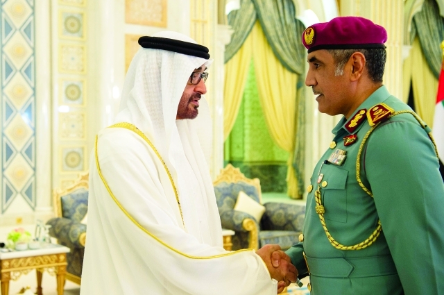 ".. ومصافحاً محمد خلفان الرميثي"