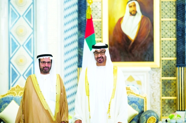 "محمد بن زايد وعلي راشد النعيمي"