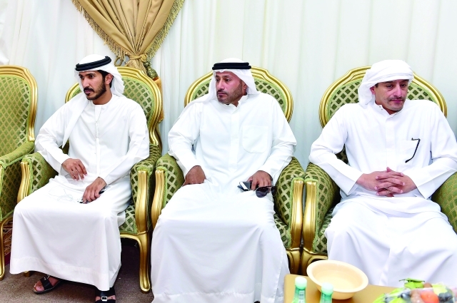 "أحمد وسعيد جابر وبدر عتيق أثناء العزاء"