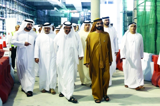 "محمد بن راشد لدى زيارته موقع متحف الإتحاد بحضور مكتوم بن محمد ومحمد المر ومحمد القرقاوي وأنور قرقاش ومطر الطاير وهلال المري تصوير خليفة عيسى"