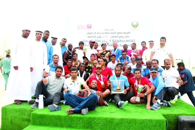 "■ فريق شرطة دبي بعد تتويجه في البطولة | البيان"