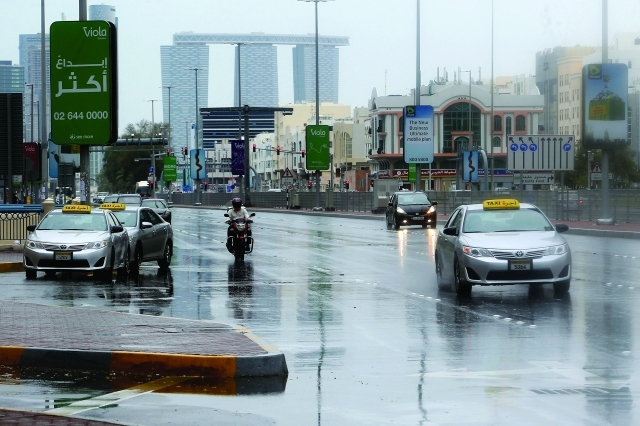 "■ أمطار الخير عمت مناطق الدولة أمس | تصوير: مجدي إسكندر"