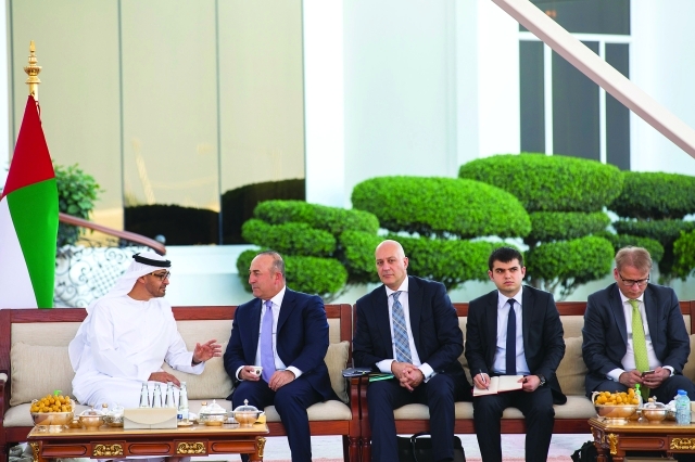"■ محمد بن زايد ووزير الخارجية التركي والوفد المرافق"