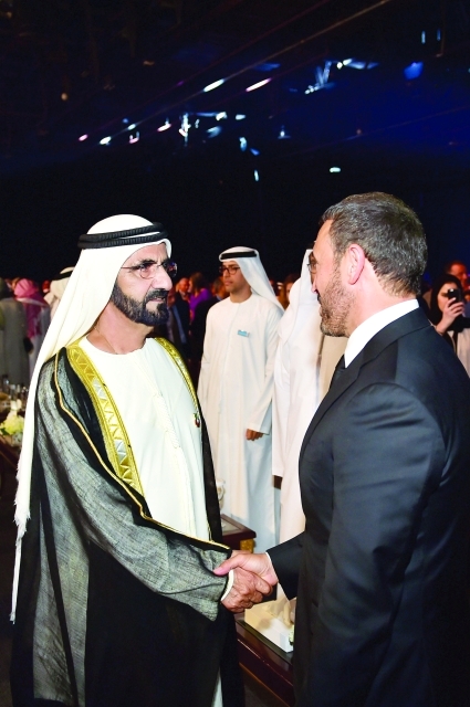 "■ نائب رئيس الدولة مصافحاً كاظم الساهر"