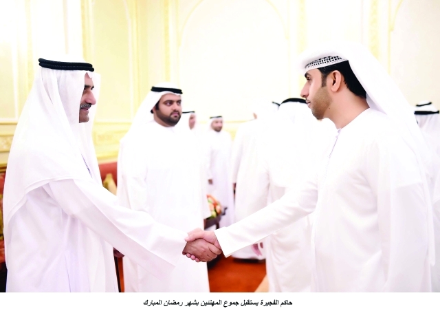 "■ حمد الشرقي بحضور محمد بن حمد خلال استقبال المهنئين |  وام"