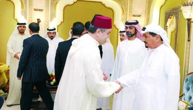 "■ حميد النعيمي مستقبلاً المهنئين بحضور عمار وراشد النعيمي | وام"