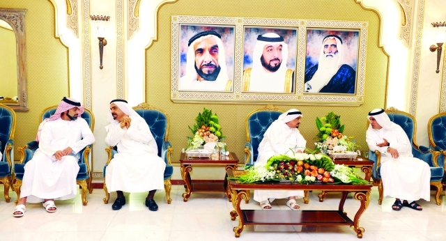 "■ حميد النعيمي بحضور عمار بن حميد خلال استقبال المهنئين | وام"