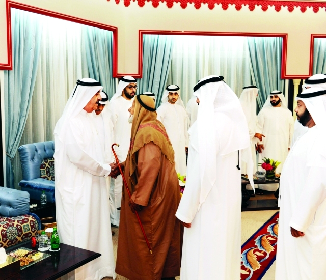 "■ سعود المعلا بحضور راشد بن سعود مستقبلاً المهنئين"