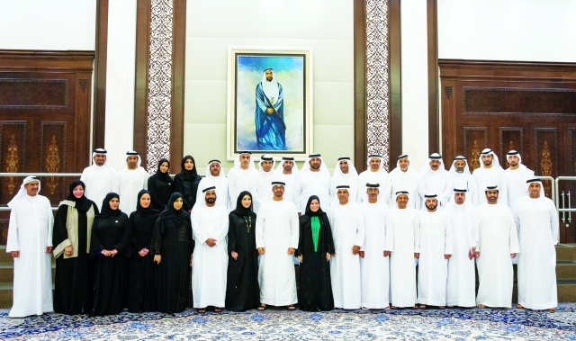 "■ محمد بن زايد يتوسط أعضاء المجلس الوطني الاتحادي بحضور أمل القبيسي | وام"