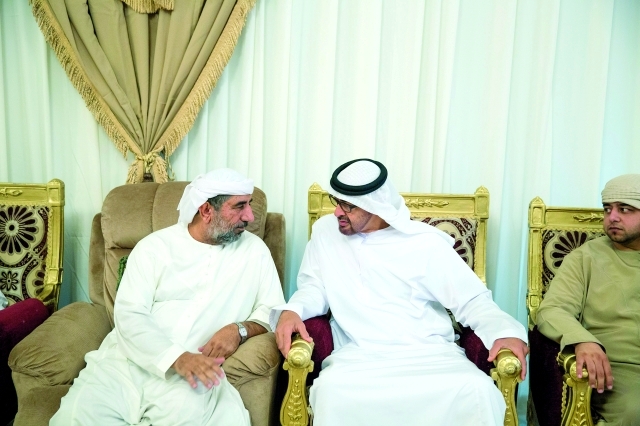 "■ محمد بن زايد خلال تقديمه العزاء لأسرة الشهيد أحمد الزيودي"