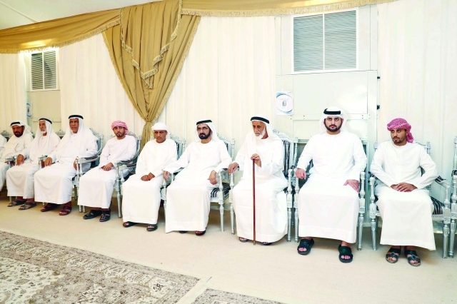 "■ نائب رئيس الدولة خلال أداء واجب العزاء في الشهيد اليماحي بحضور مكتوم بن محمد"