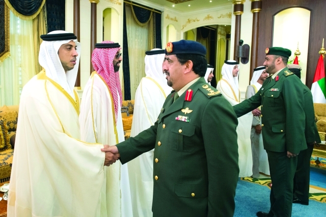 "■ طحنون ومنصور بن زايد خلال استقبال المهنئين"