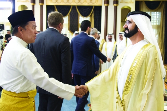 "نائب رئيس الدولة لدى استقباله أعضاء السلك الدبلوماسي بحضور حمدان بن محمد وحمدان بن راشد وحمدان بن زايد"