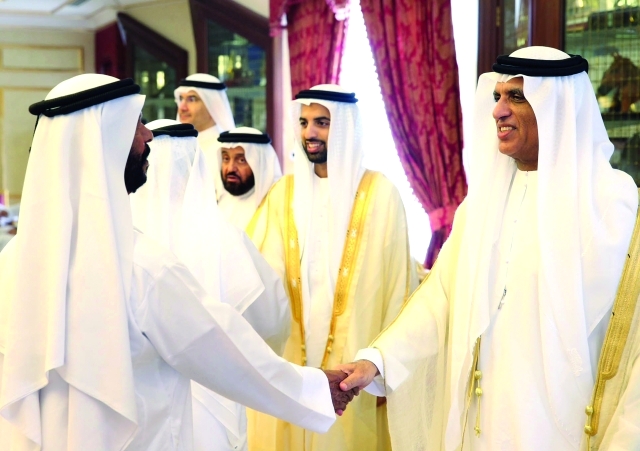 "سعود بن صقر ومحمد بن سعود خلال استقبال المهنئين بالعيد"