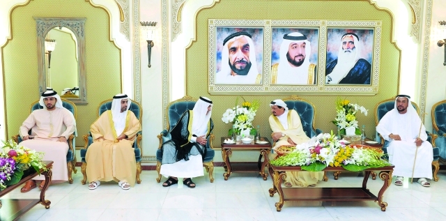 "حميد النعيمي خلال استقباله المهنئين بحضور أحمد وراشد النعيمي | وام"