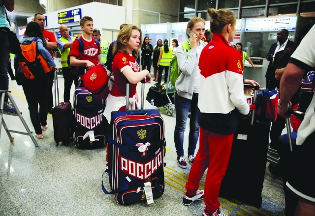 "■ الرياضيون الروسيون تنفسوا الصعداء وسافروا الى البرازيل | أف ب"