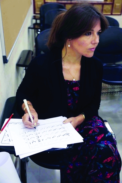 "■ كارولين إحدى المشاركات في الدورة"