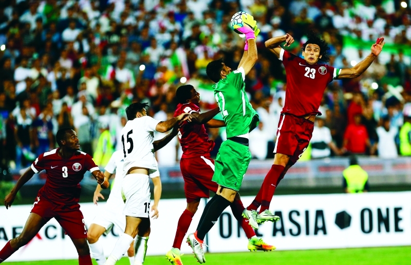 "■ من مباراة قطر وإيران في التصفيات الآسيوية | أ ف ب"