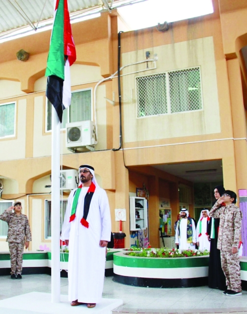 "حسين الحمادي خلال الاحتفال بيوم العلم"