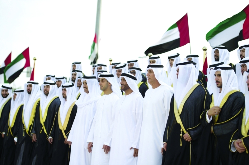 "■ نهيان وخالد بن زايد مع العرسان"