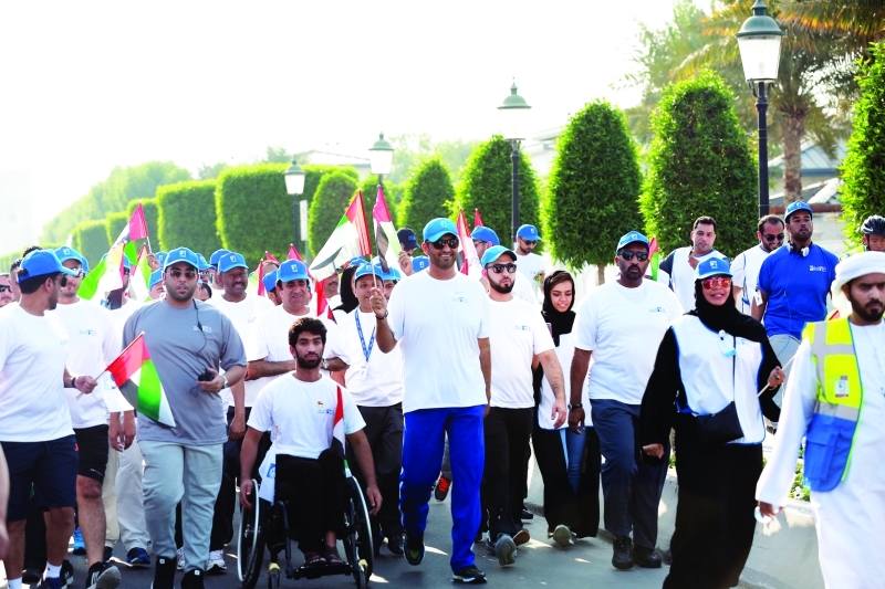 "■ سلطان الجابر يتقدم المشاركين في المسيرة تحت عنوان «روح الفريق الواحد بطاقة إيجابية» | البيان"