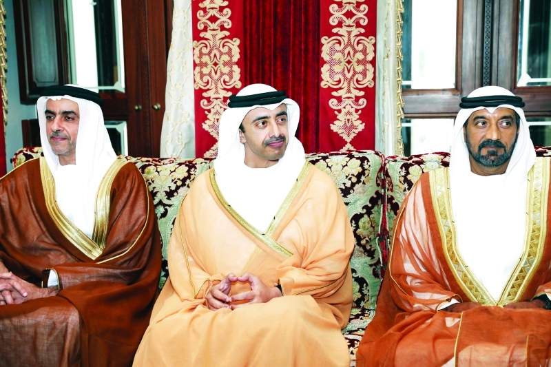 "■ سيف وعبدالله بن زايد وأحمد بن سعيد خلال اللقاء"
