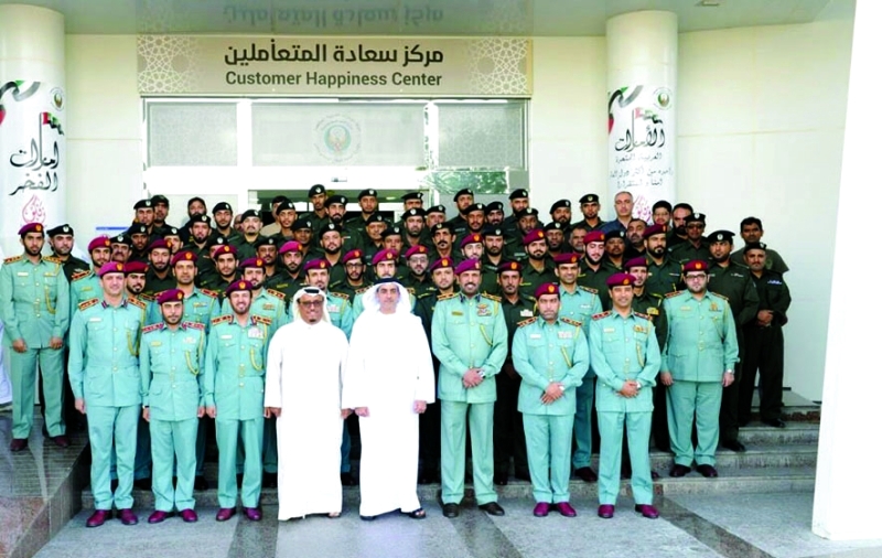 "■ سيف بن زايد في صورة تذكارية مع فريق الدفاع المدني بدبي بحضور ضاحي خلفان وناصر لخريباني وراشد المطروشي | من المصدر"
