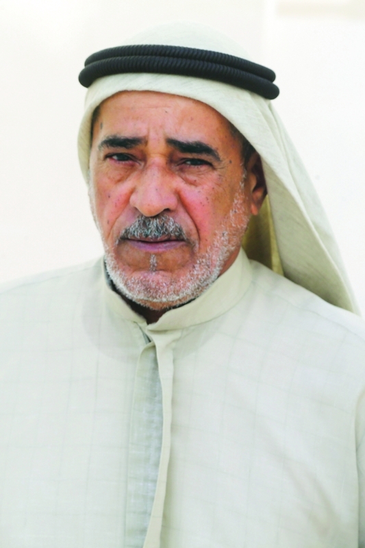 "■ محمد الكعبي والد الشهيد"