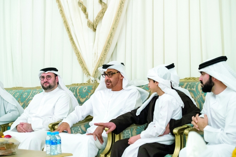 "■ محمد بن زايد خلال تقديمه العزاء لأسرة الشهيد محمد علي البستكي | وام"