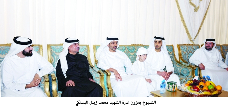 "ذياب وخالد بن زايد خلال تقديم واجب العزاء لأسرة الشهيد محمد علي البستكي"