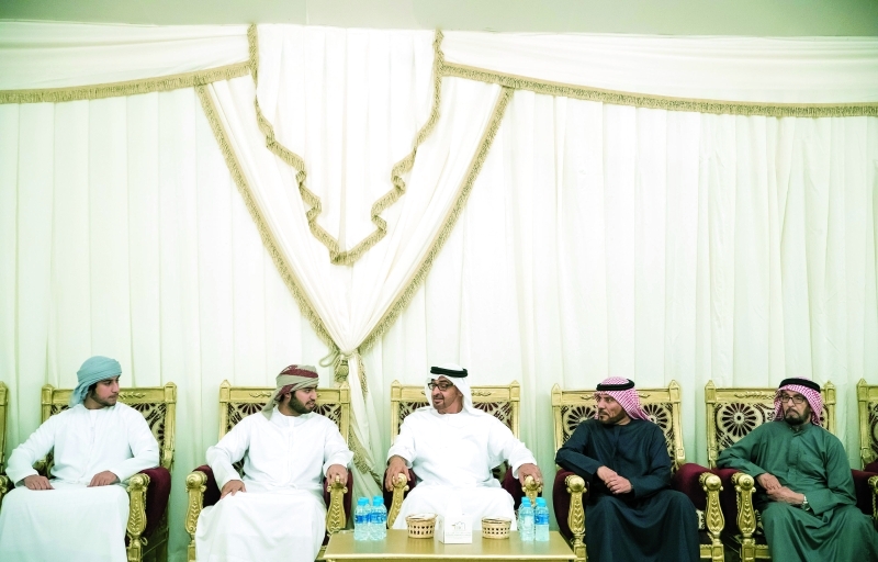 "■ محمد بن زايد خلال تقديم العزاء لأسرة الشهيد عبدالحميد الحمادي"