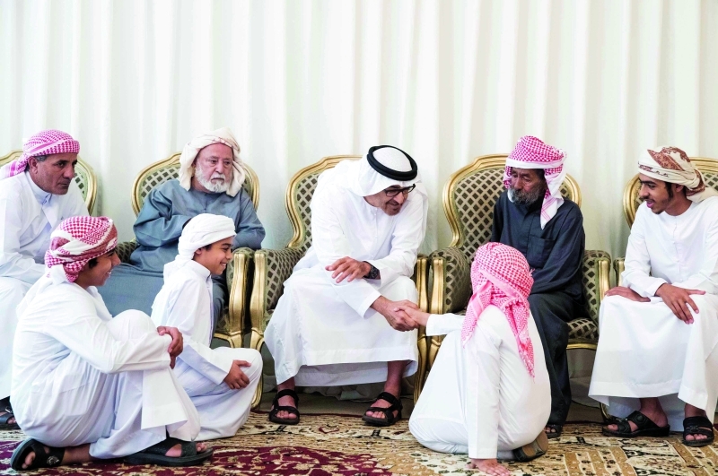 "محمد بن زايد يقدم واجب العزاء لأسرة الشهيد أحمد المزروعي"