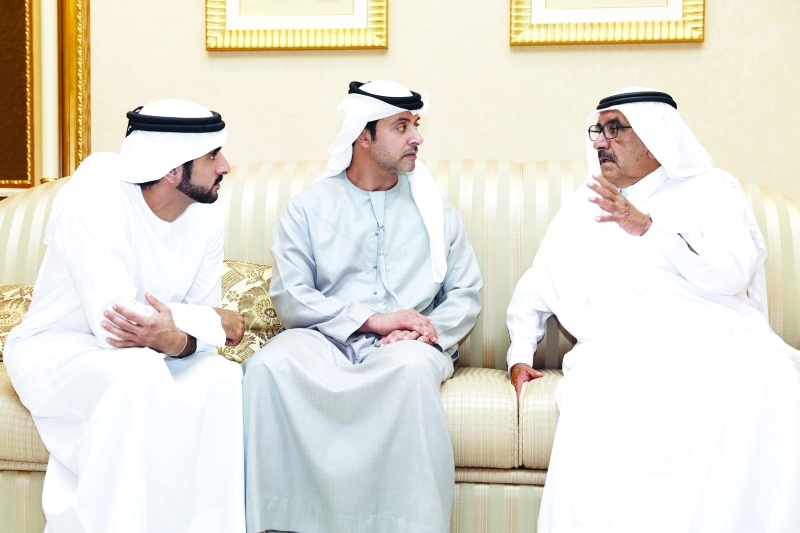 "حمدان بن محمد وحمدان بن راشد وهزاع بن زايد"