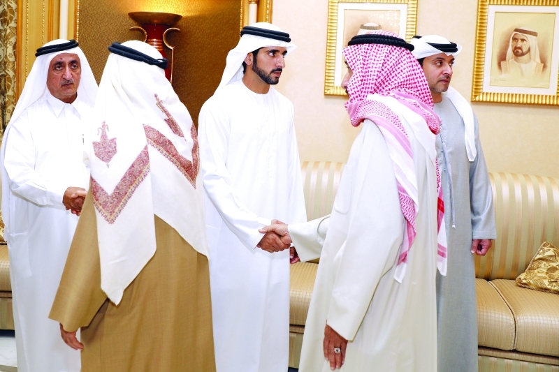 "حمدان بن محمد وهزاع بن زايد وأحمد بن مكتوم"