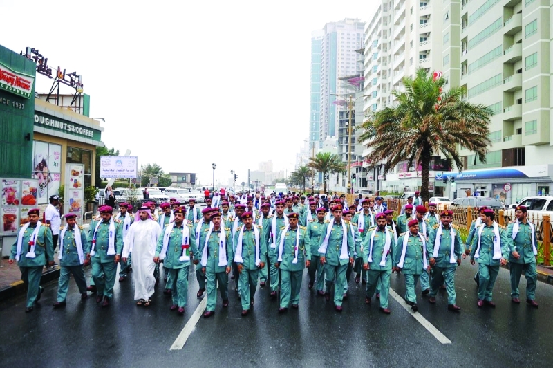 "■ شرطة عجمان تنظم مسيرة المشي"