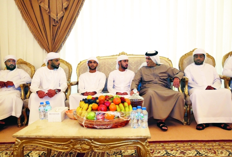 "■ سعود بن صقر خلال تقديم العزاء لأسرة الشهيد نادر مبارك"